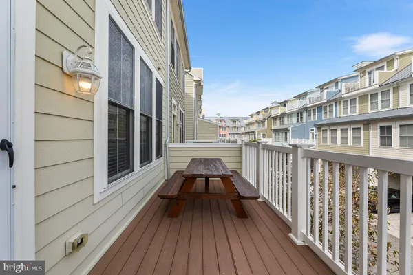 a view of a balcony with chairs