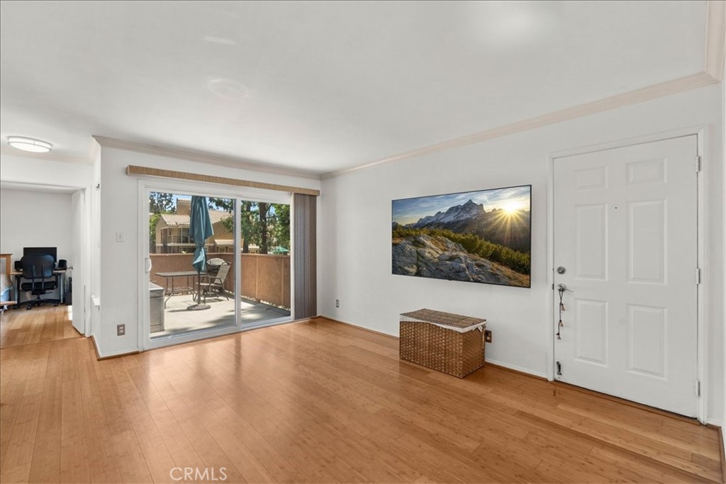 10655 Lemon Avenue, Unit 104 Rancho Cucamonga, CA 91737 - Photo 4 of 21 Living room and patio