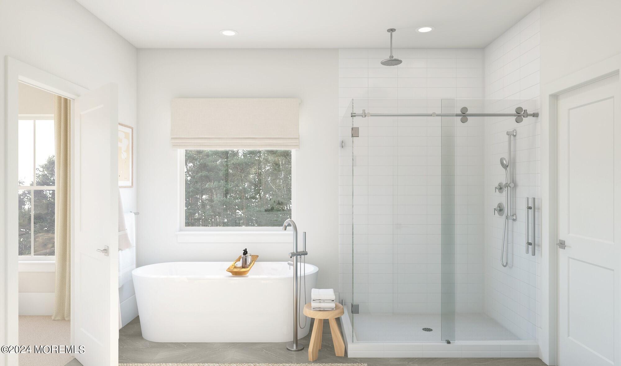 35 Carlisle Court Howell, NJ 07731 - Photo 11 of 14 a white bath tub sitting next to a shower