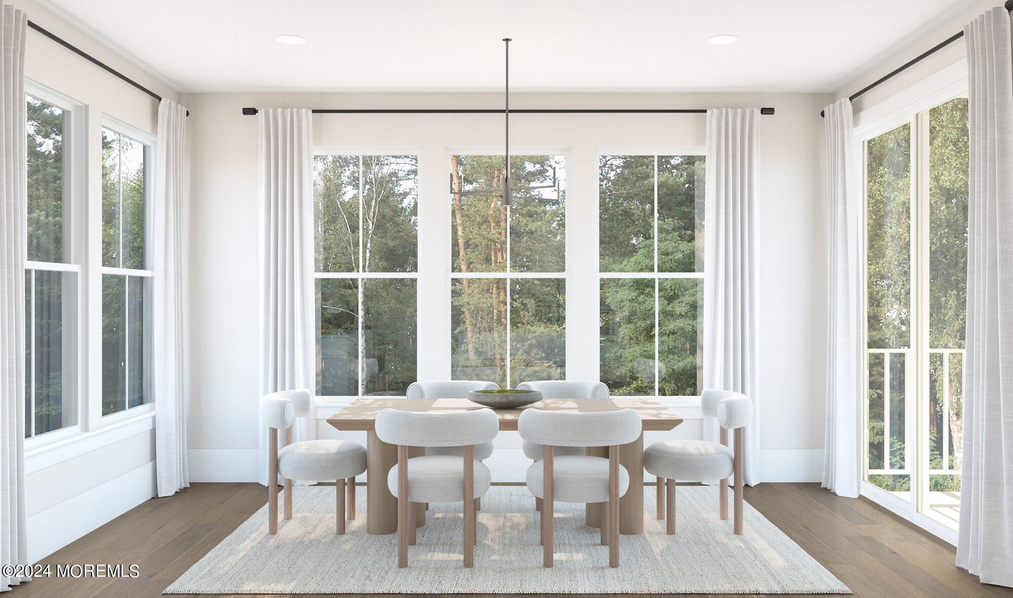 35 Carlisle Court Howell, NJ 07731 - Photo 4 of 14 a view of a dining room with furniture window and wooden floor