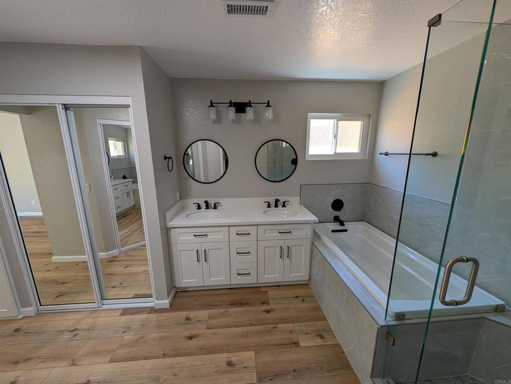 3752 Aries Escondido, CA 92025 - Photo 10 of 12 a room with a sink and a mirror