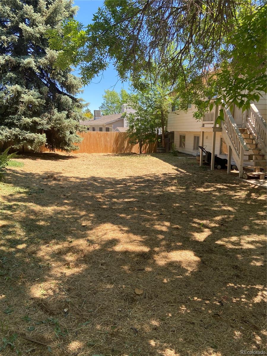 11123 Eudora Place Thornton, CO 80233 - Photo 25 of 26 a view of a town with large trees