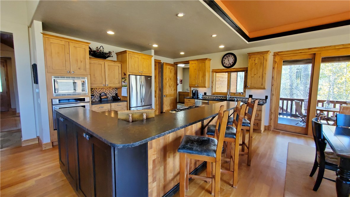 135 Game Trail Road Silverthorne, CO 80498 - Photo 9 of 34 Leathered granite counters in the kitchen.