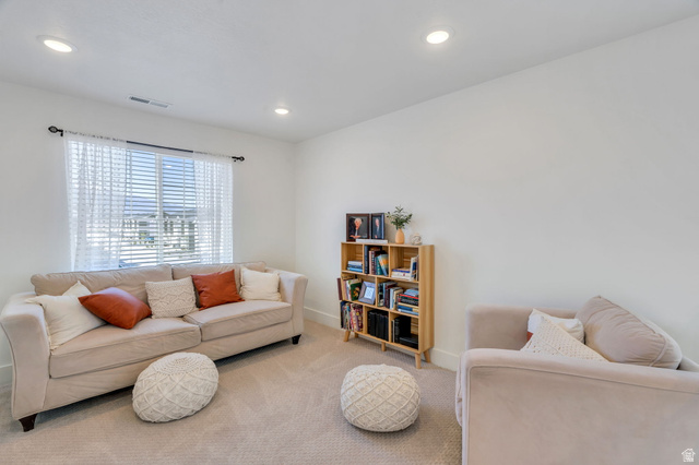 2664 West Maple Street Mapleton, UT 84664 - Photo 19 of 49 Spacious room featuring neutral carpeting, recessed lighting, and a large window with horizontal blinds
