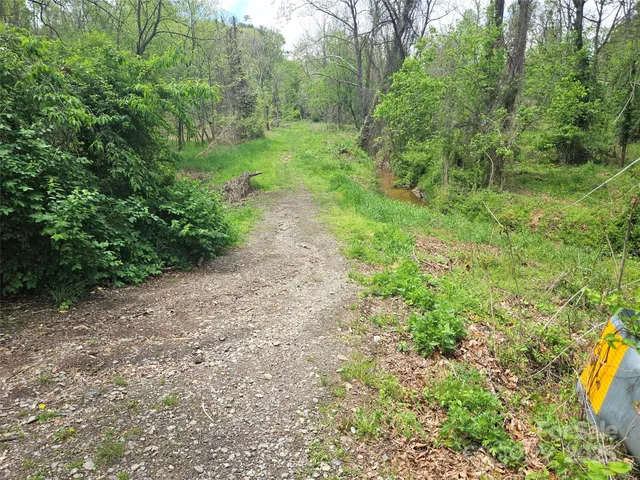 a view of a building with a road