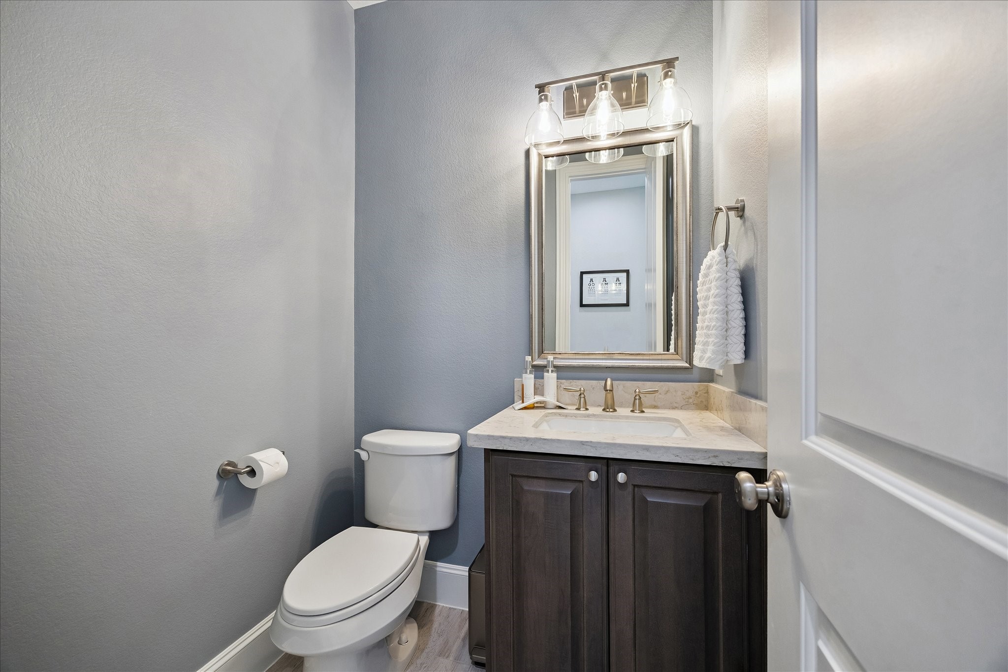 2807 Mayfield Ridge Lane Katy, TX 77494 - Photo 28 of 50 a bathroom with a granite countertop sink toilet and mirror