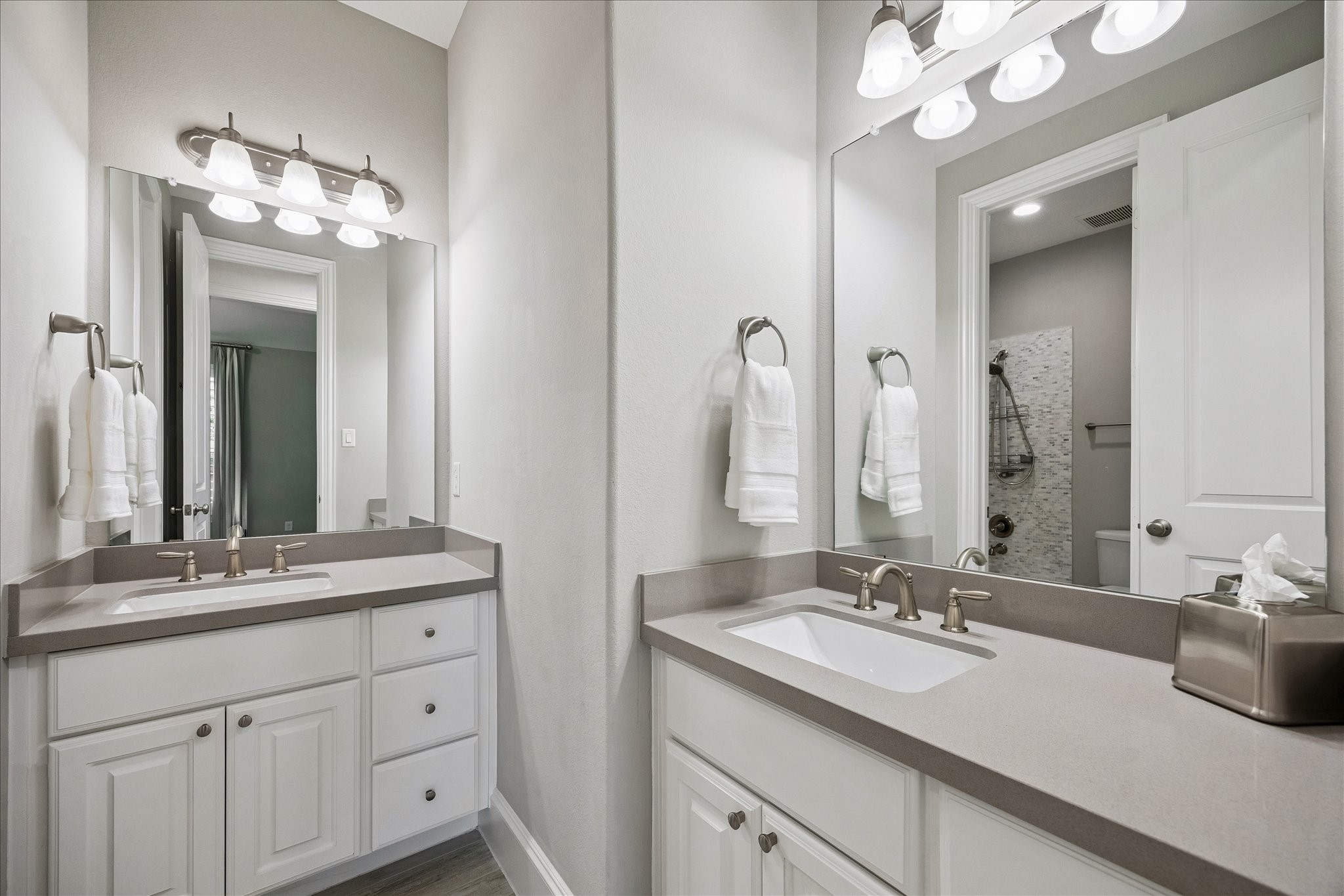 2807 Mayfield Ridge Lane Katy, TX 77494 - Photo 33 of 50 a bathroom with a sink vanity and a mirror