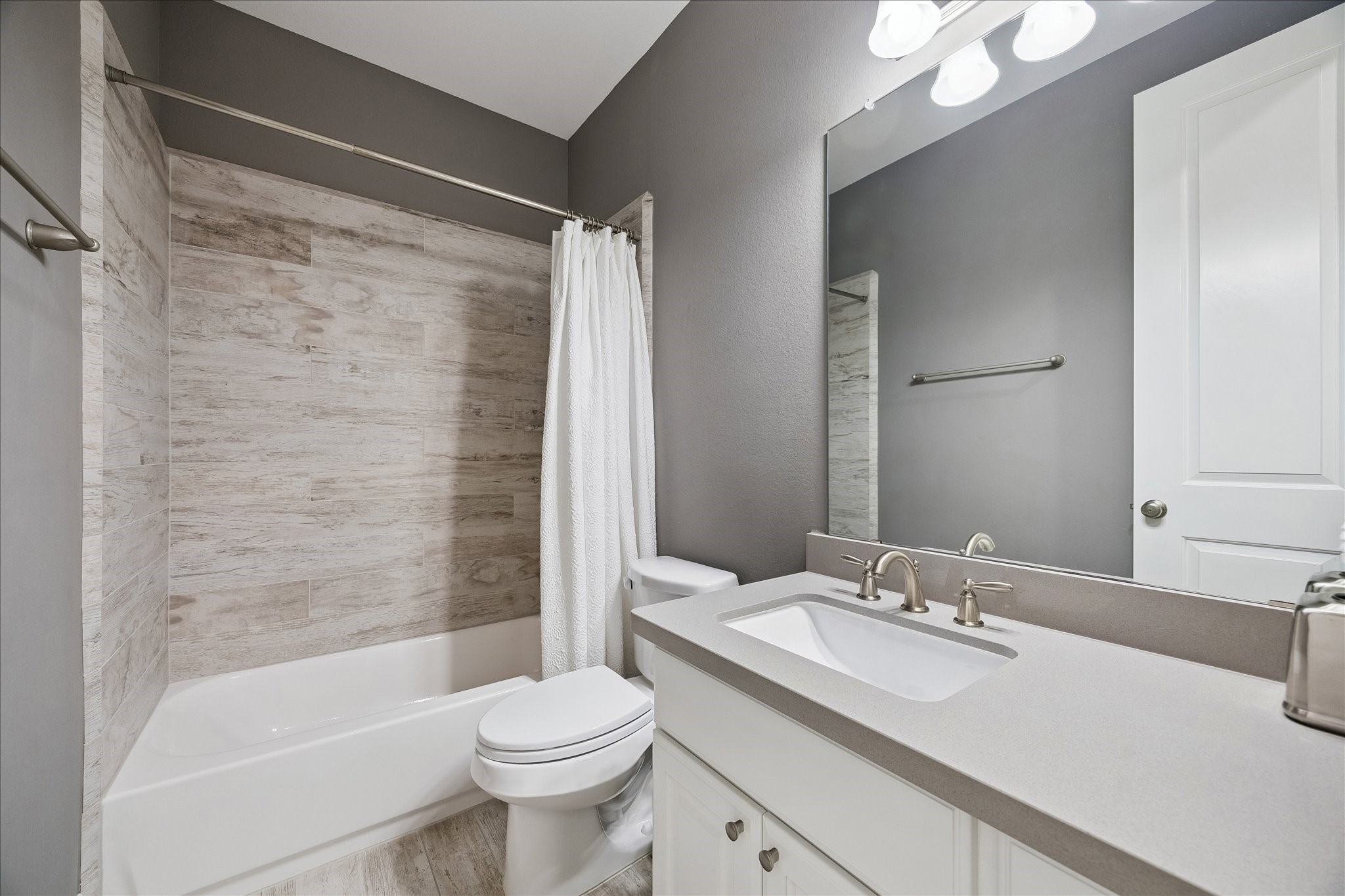 2807 Mayfield Ridge Lane Katy, TX 77494 - Photo 35 of 50 a bathroom with a sink toilet and shower