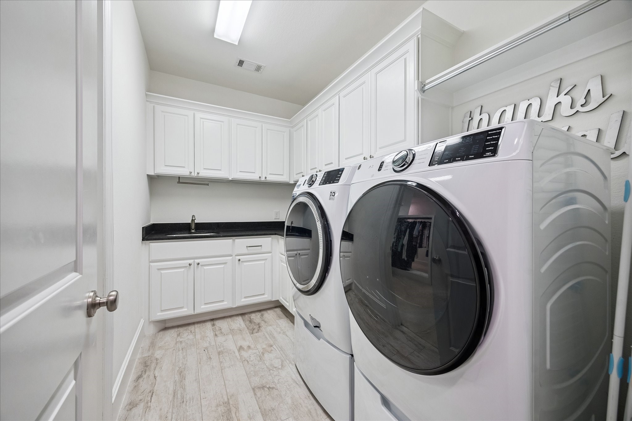 2807 Mayfield Ridge Lane Katy, TX 77494 - Photo 39 of 50 a utility room with dryer and washer