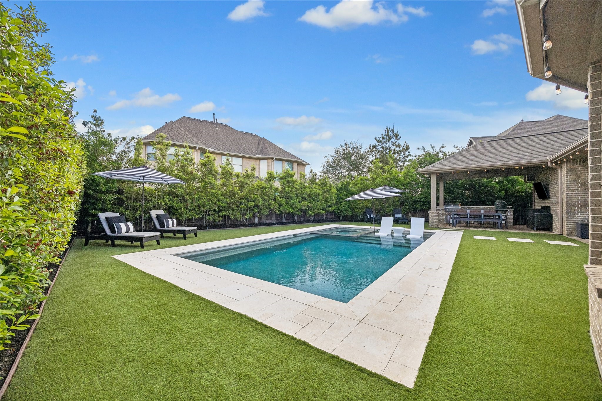 2807 Mayfield Ridge Lane Katy, TX 77494 - Photo 45 of 50 a view of a swimming pool with a patio