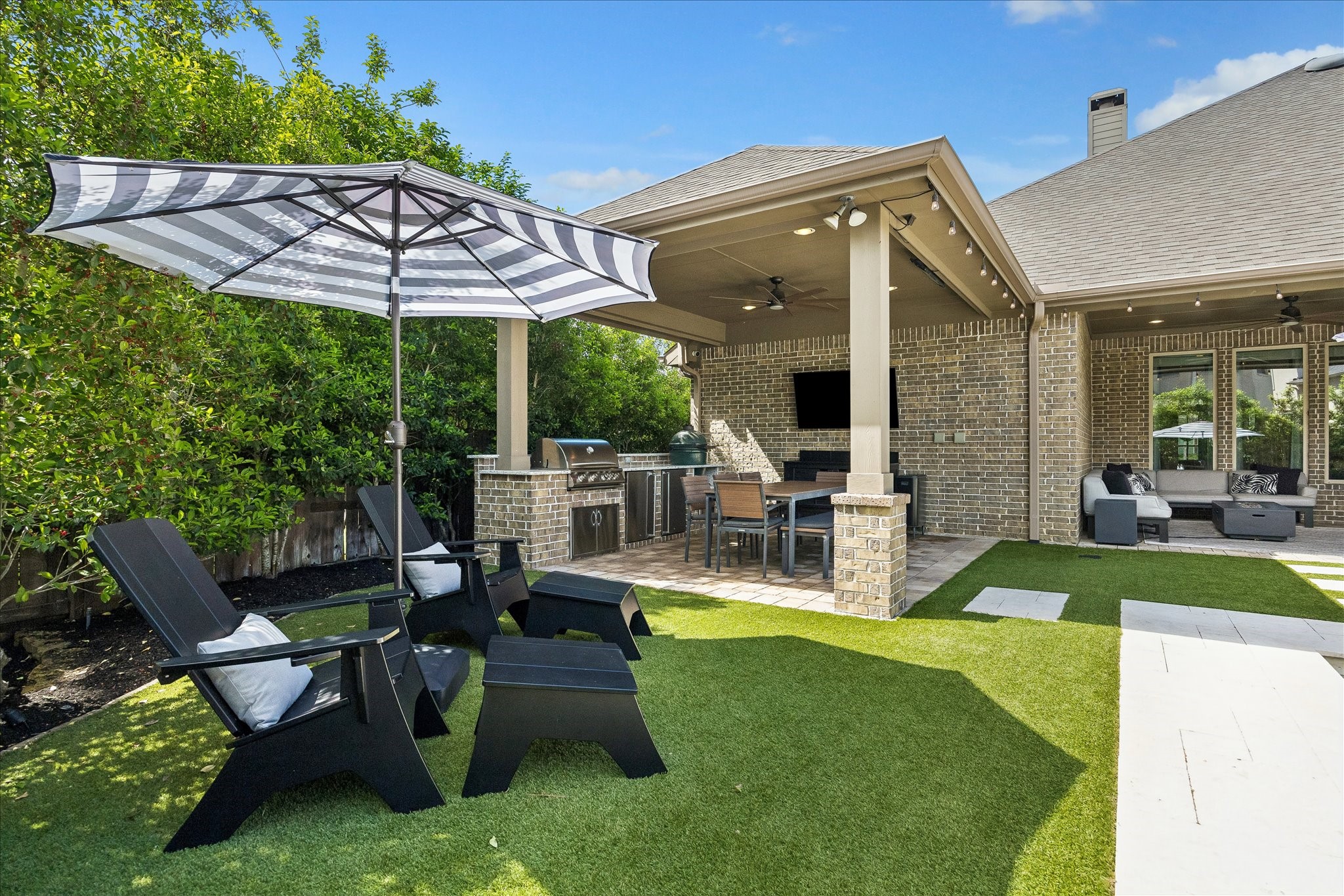 2807 Mayfield Ridge Lane Katy, TX 77494 - Photo 47 of 50 a view of a house with backyard porch and sitting area