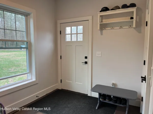 a kitchen with granite countertop a stove and a refrigerator