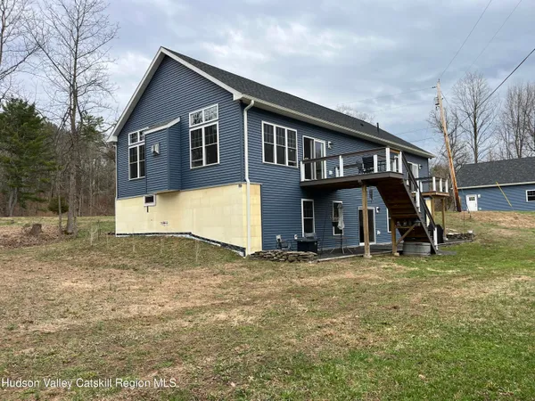 a view of backyard of house