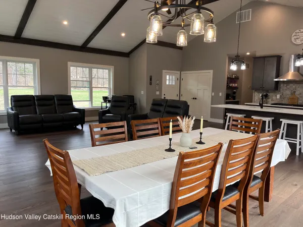 a view of a dining room with furniture