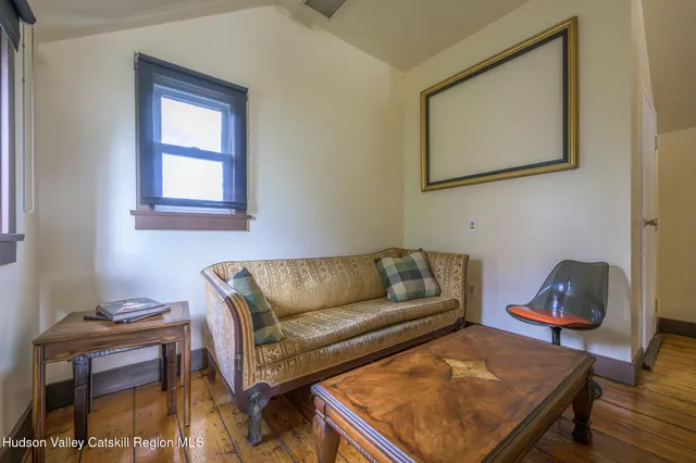 a view of a house with a snow on the ground