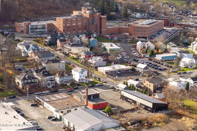a picture of a book and a white bed