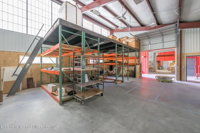 a view of a room with wooden roof