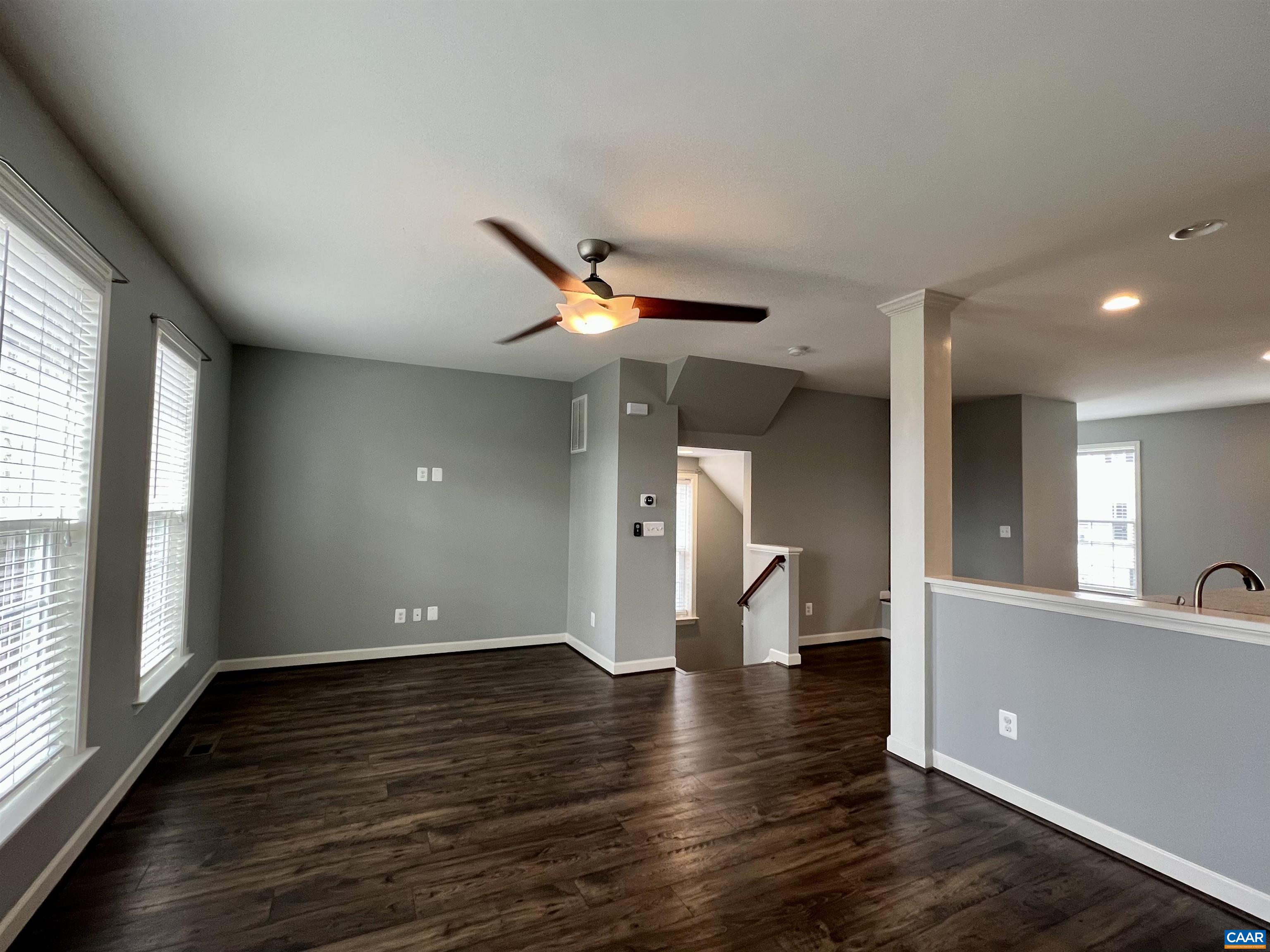 2545 Avemore Pond Road Charlottesville, VA 22911 - Photo 4 of 17 a view of an empty room with wooden floor and a window