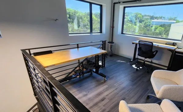 a view of a living room and a window