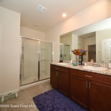 a view of a bedroom with closet