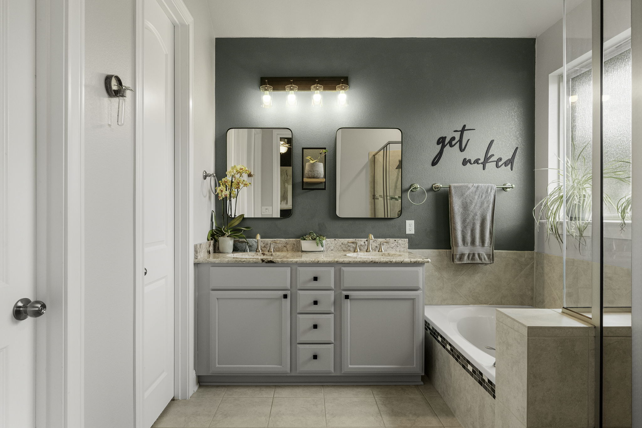 772 Founders Ridge Dripping Springs, TX 78620 - Photo 23 of 40 Clean finishes and a spacious layout create a calming, spa- inspired atmosphere within the primary bathroom.