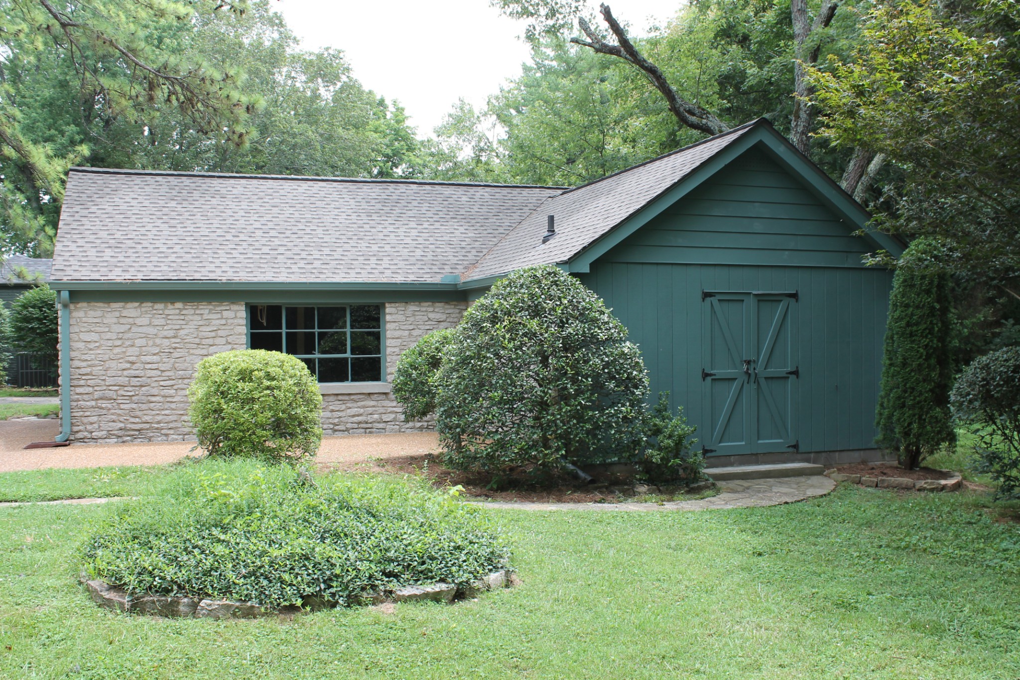 207 Battle Avenue Franklin, TN 37064 - Photo 12 of 67 a front view of a house with garden