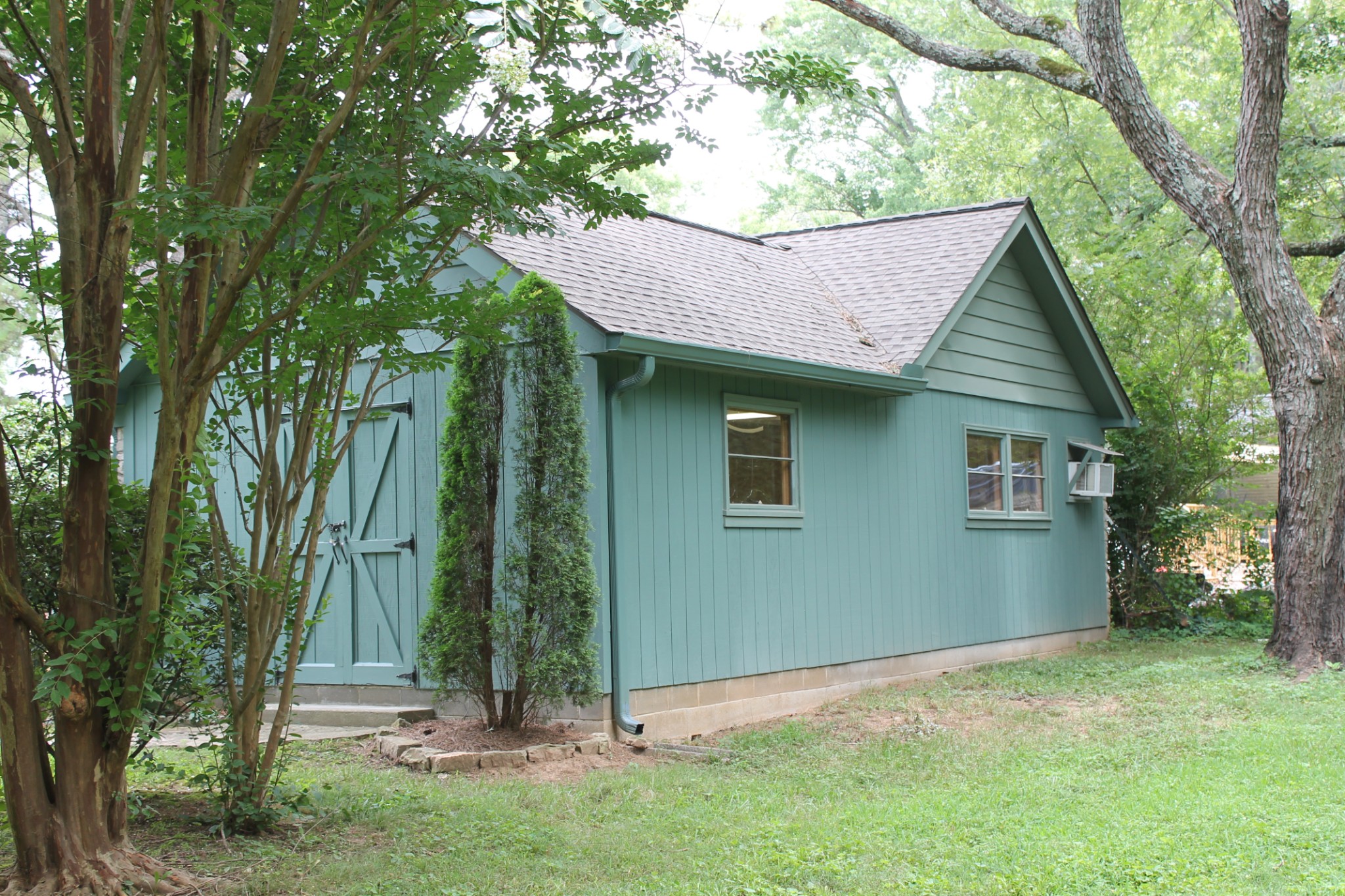 207 Battle Avenue Franklin, TN 37064 - Photo 13 of 67 a backyard of a house with plants and trees