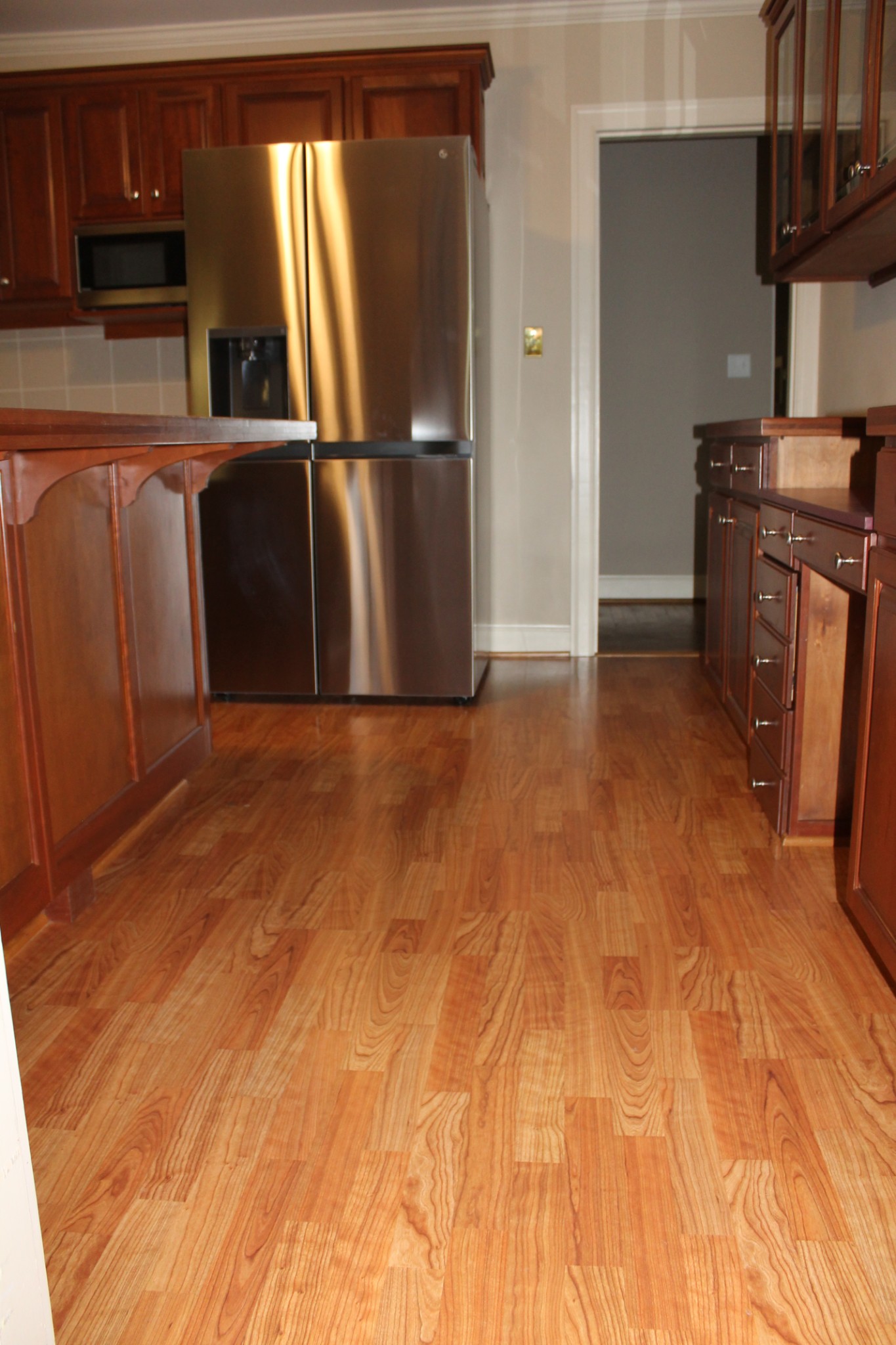 207 Battle Avenue Franklin, TN 37064 - Photo 16 of 67 a kitchen with stainless steel appliances granite countertop a refrigerator a stove and a sink