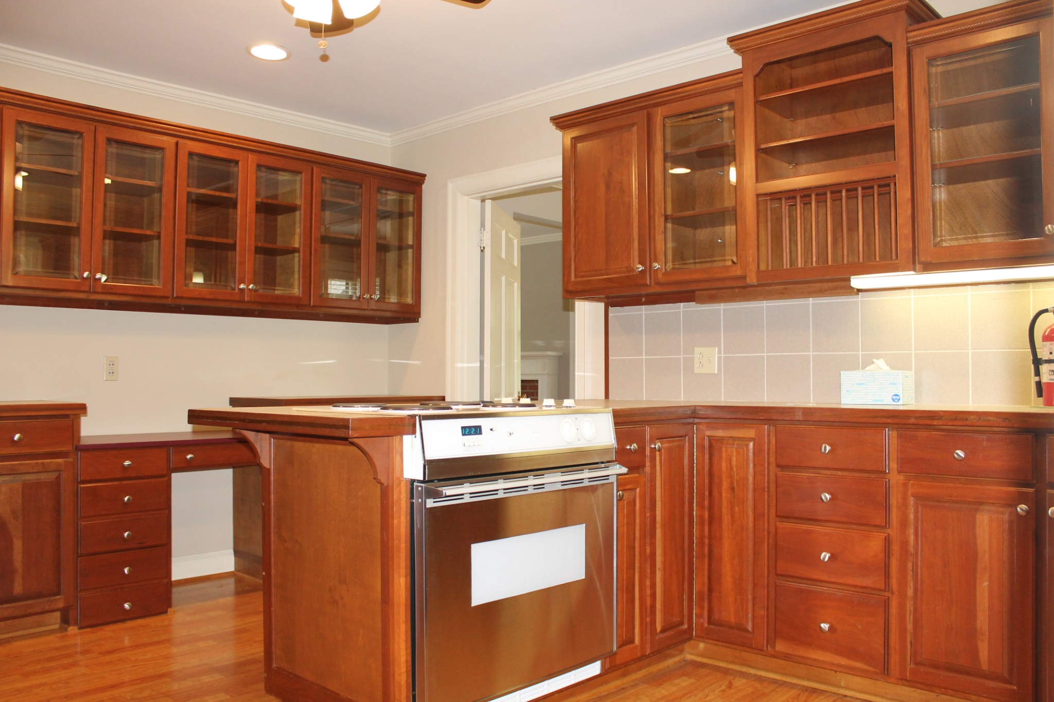 207 Battle Avenue Franklin, TN 37064 - Photo 19 of 67 a kitchen with stainless steel appliances granite countertop a stove and a cabinets