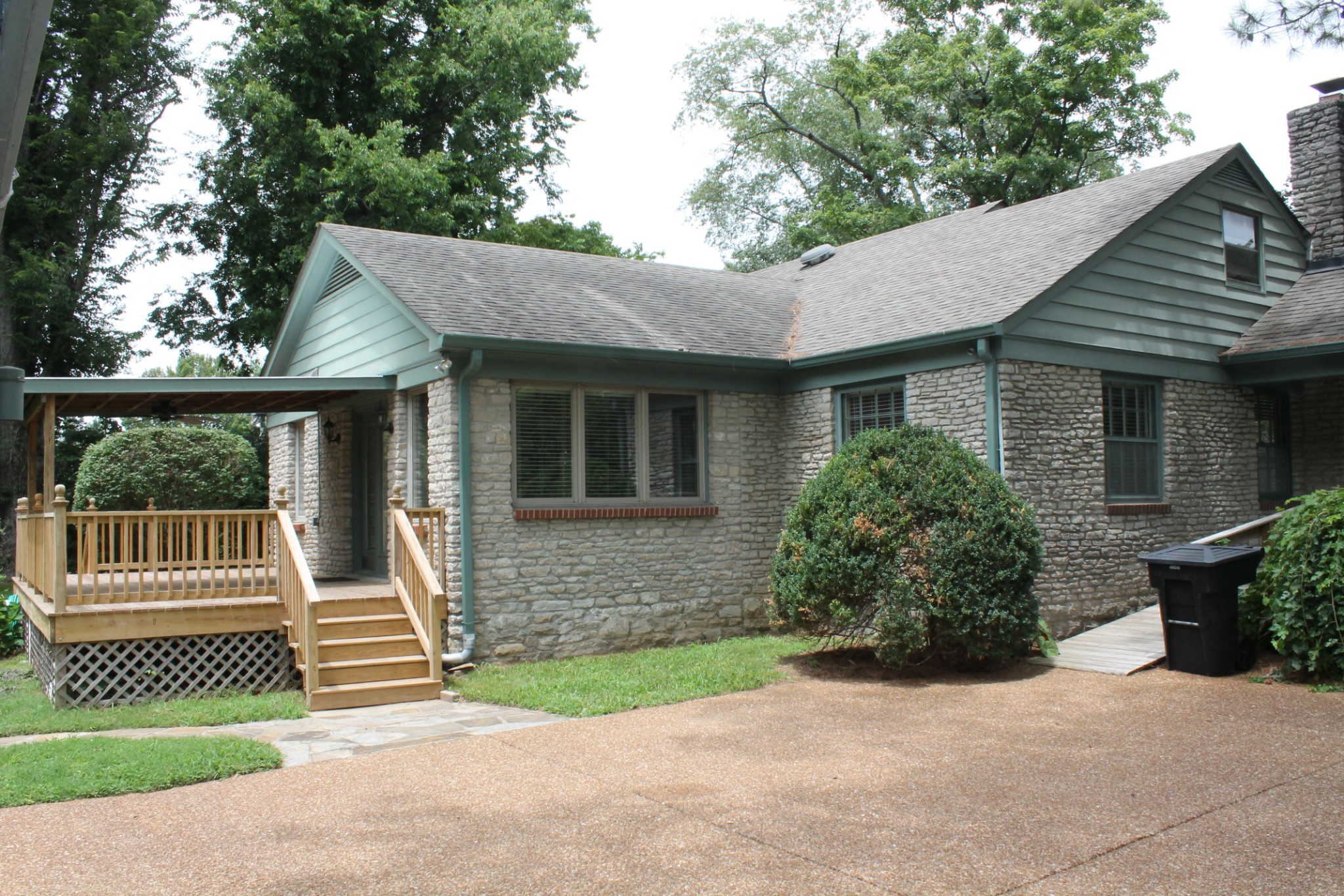 207 Battle Avenue Franklin, TN 37064 - Photo 3 of 67 a front view of a house with a garden