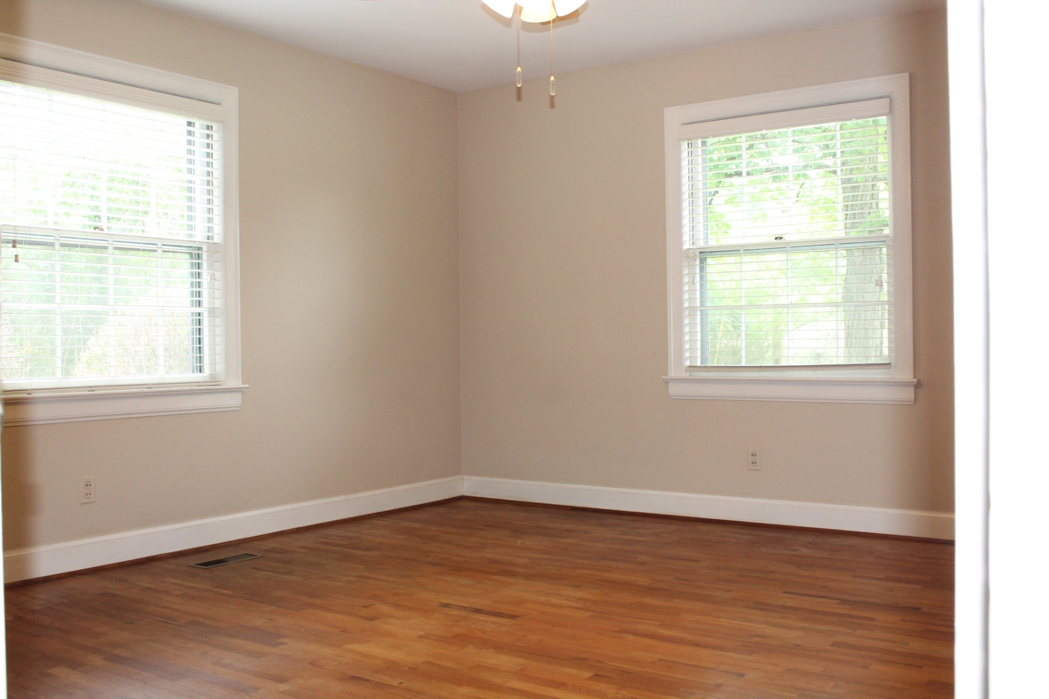 207 Battle Avenue Franklin, TN 37064 - Photo 45 of 67 an empty room with wooden floor and windows
