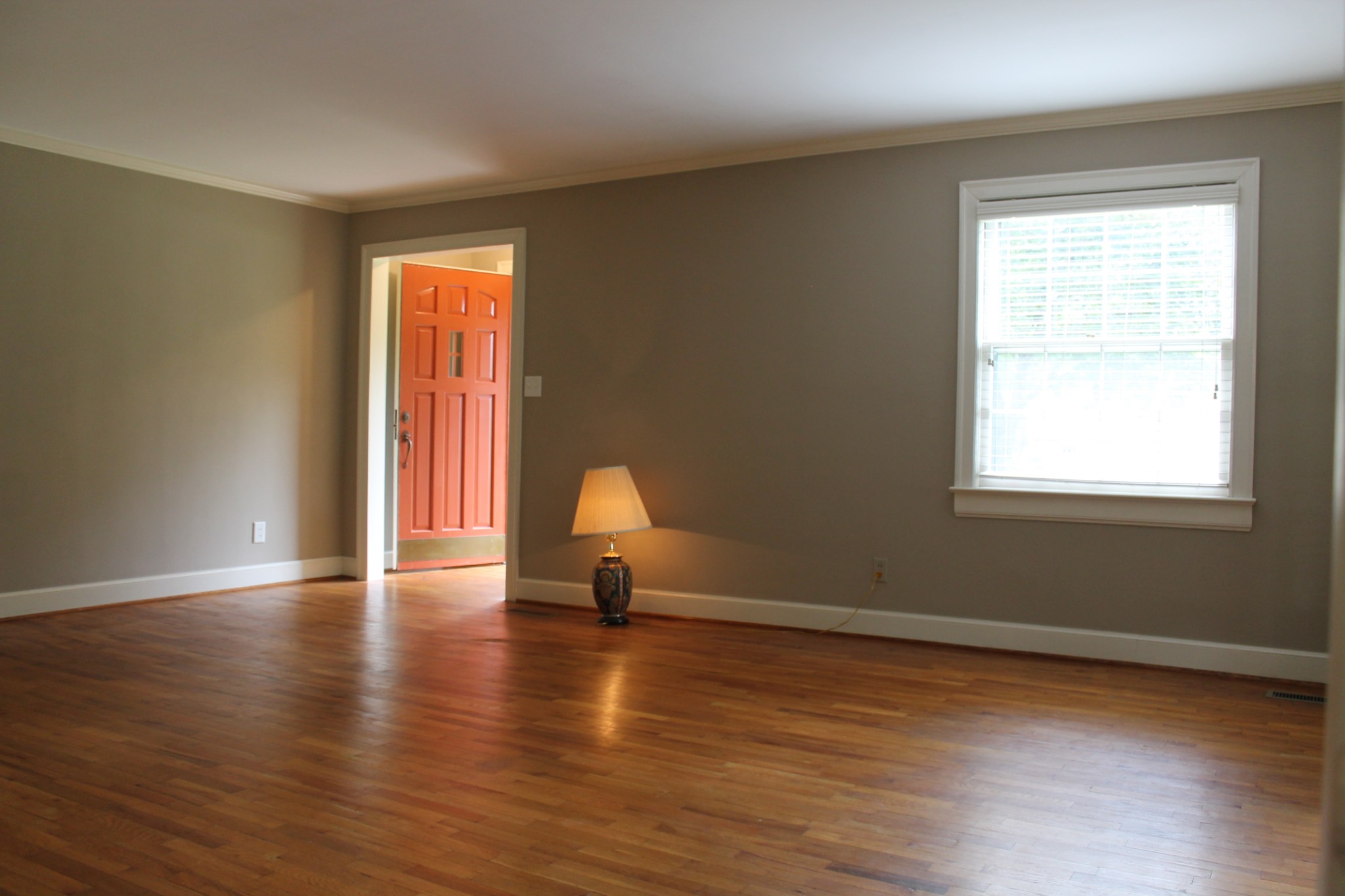 207 Battle Avenue Franklin, TN 37064 - Photo 60 of 67 a view of an empty room with wooden floor and a window