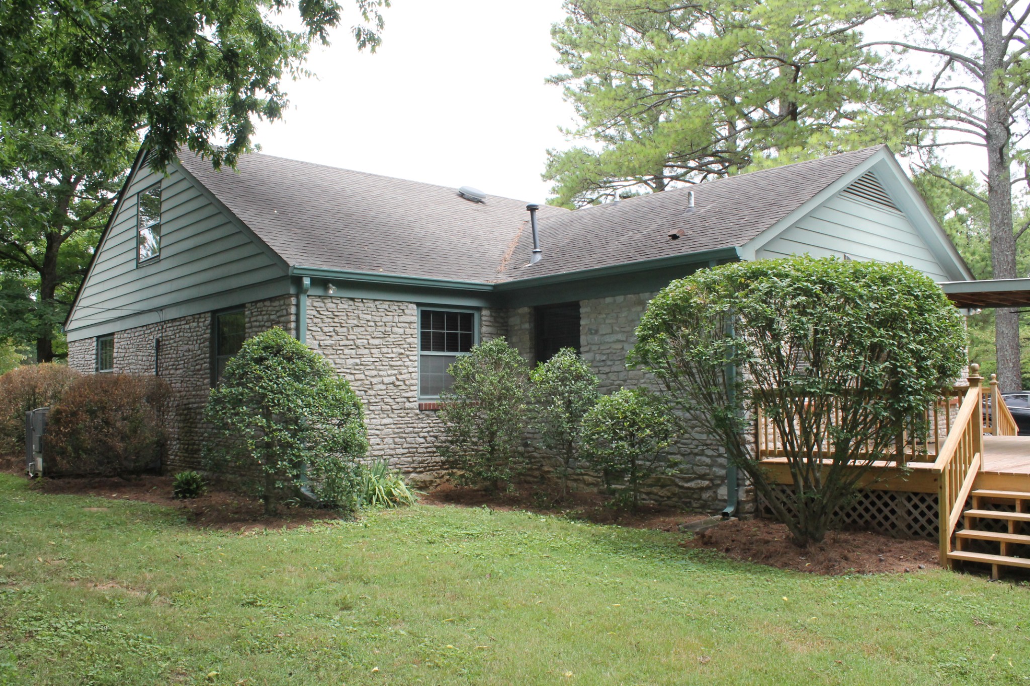 207 Battle Avenue Franklin, TN 37064 - Photo 6 of 67 a front view of a house with garden