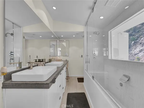 a view of livingroom with washer and dryer