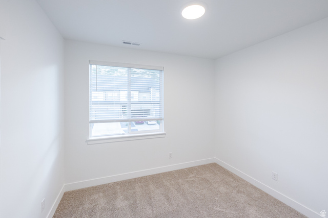 4704 Olive Avenue, Unit V202 Mapleton, UT 84664 - Photo 10 of 17 Recessed ceiling lighting, neutral carpet, white walls, and a window with horizontal blinds