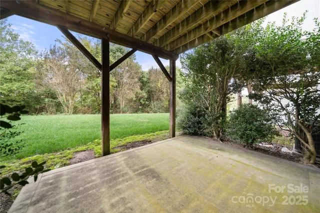 a view of a room with porch and garden