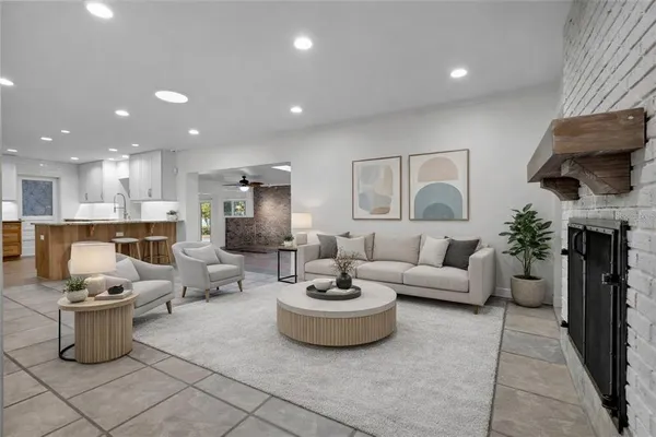 a living room with furniture and a table