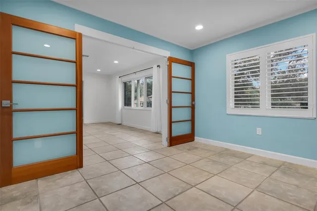 a view of an empty room with a window