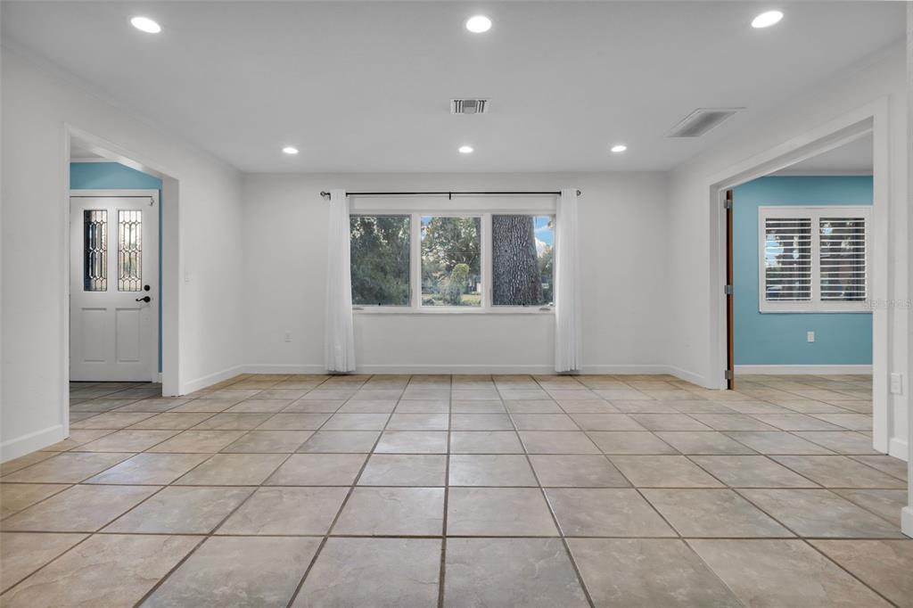 307 West 4th Avenue Windermere, FL 34786 - Photo 14 of 56 a view of an empty room with a window