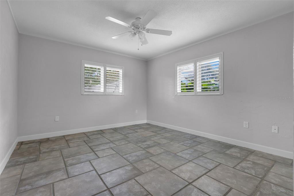 307 West 4th Avenue Windermere, FL 34786 - Photo 23 of 56 a view of an empty room with a window