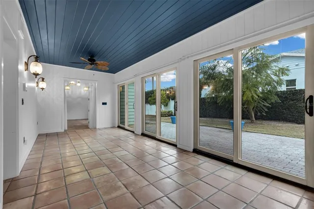 a view of empty room with windows