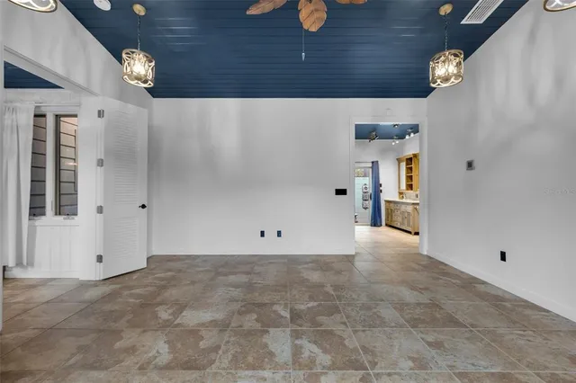 a bathroom with a tub sink a mirror and a shower