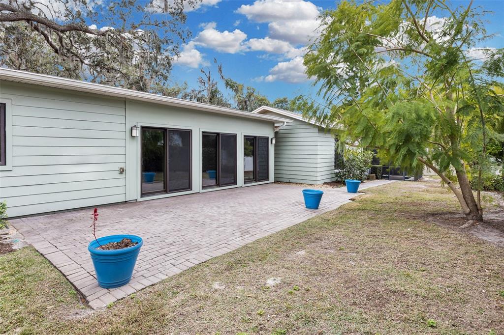 307 West 4th Avenue Windermere, FL 34786 - Photo 49 of 56 a view of a small house with potted plants