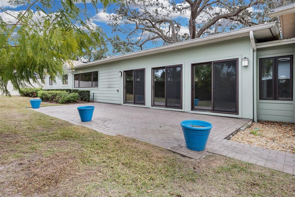 307 West 4th Avenue Windermere, FL 34786 - Photo 51 of 56 a view of a house with backyard and sitting area