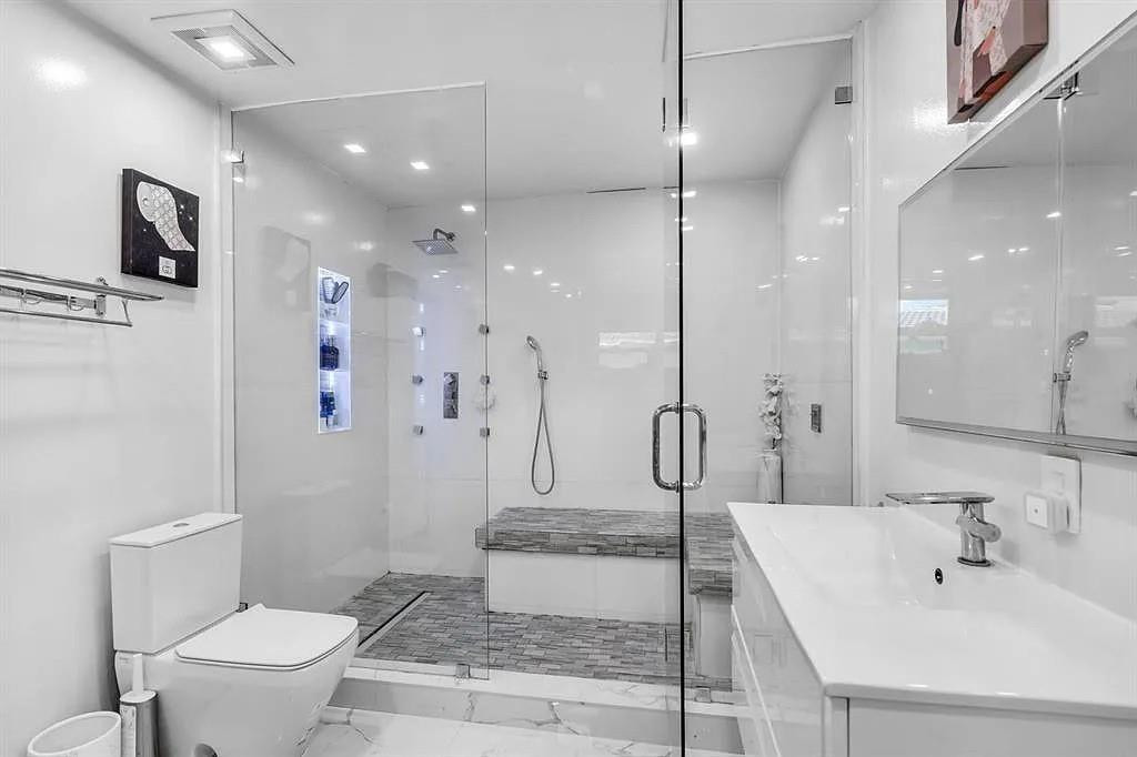 4100 North 36th Avenue Hollywood, FL 33021 - Photo 11 of 12 a bathroom with a sink a toilet and shower