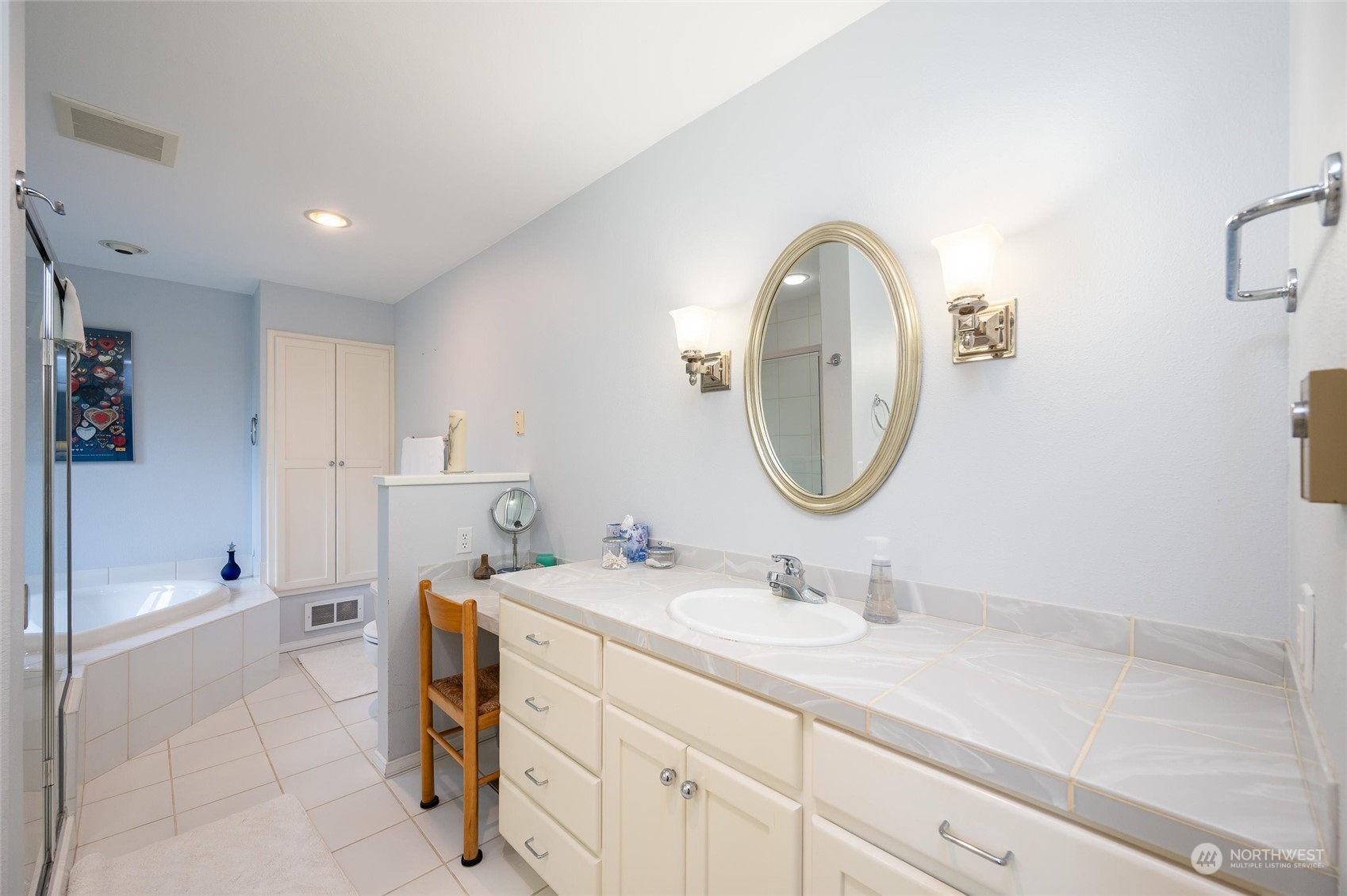 1835 High Noon Road Bellingham, WA 98226 - Photo 18 of 40 a spacious bathroom with a double vanity sink a mirror and a bathtub