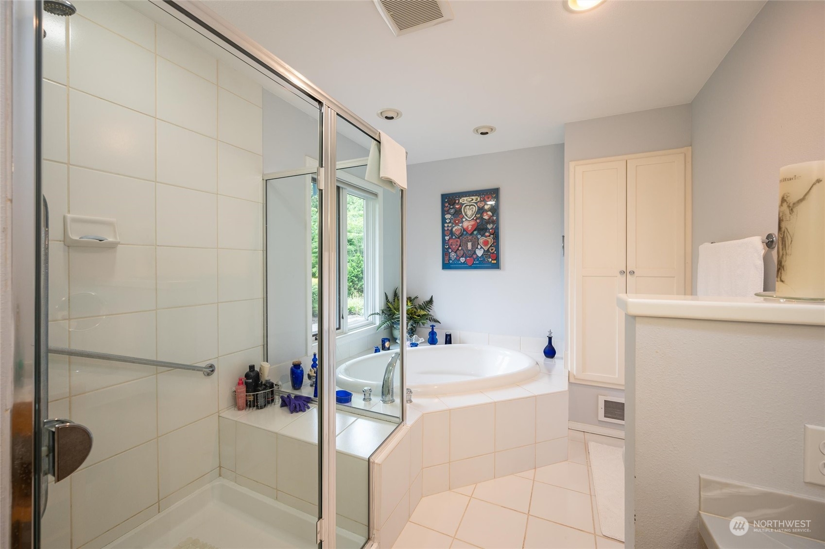 1835 High Noon Road Bellingham, WA 98226 - Photo 19 of 40 a bathroom with a bathtub and a shower