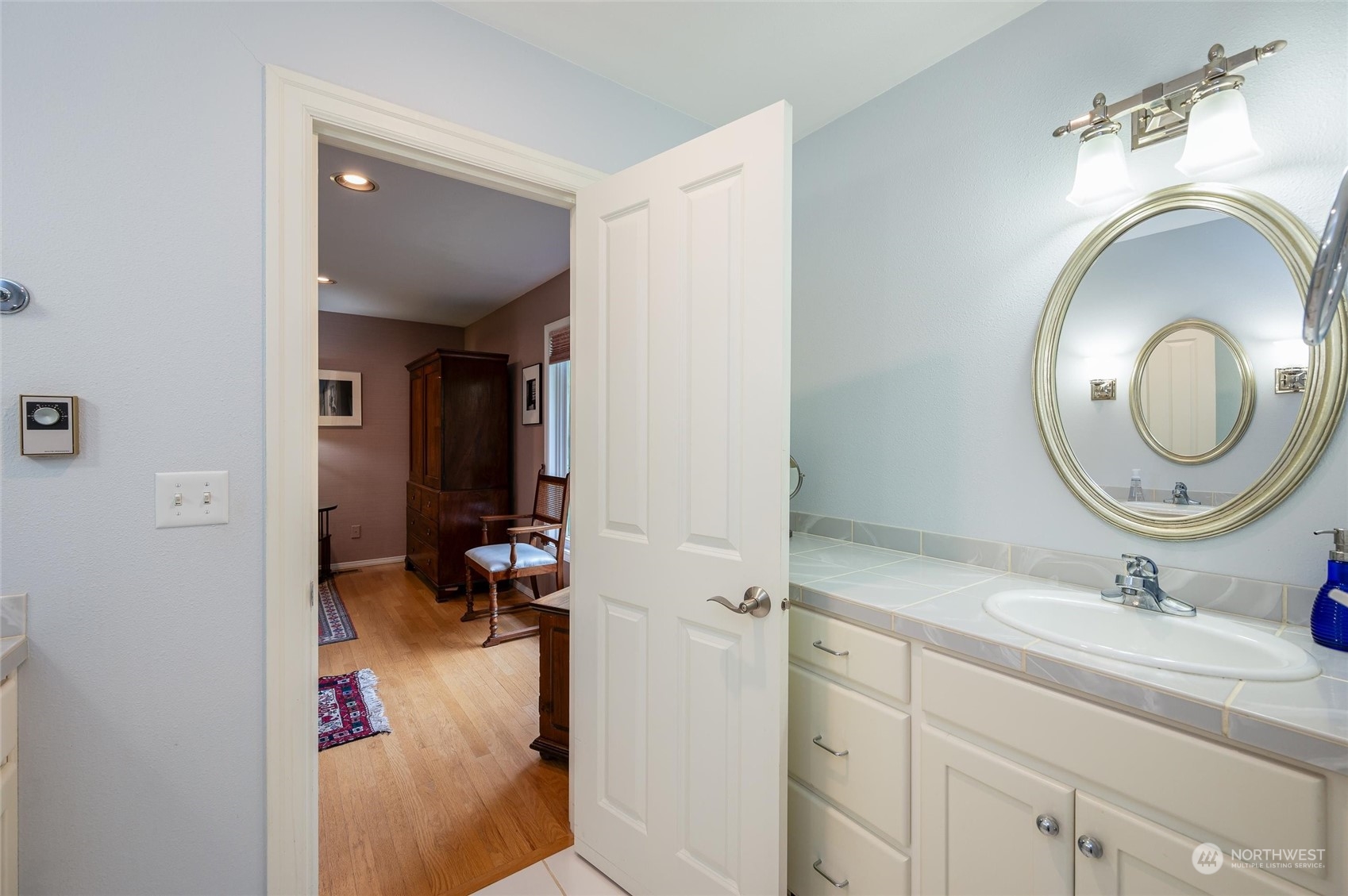 1835 High Noon Road Bellingham, WA 98226 - Photo 20 of 40 a en suite bathroom with a sink and a mirror