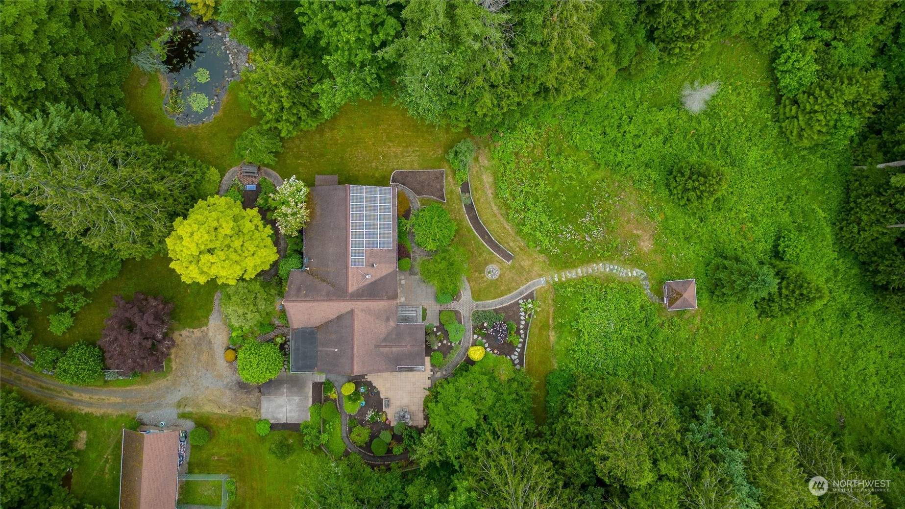 1835 High Noon Road Bellingham, WA 98226 - Photo 2 of 40 an aerial view of a residential houses with outdoor space and trees all around