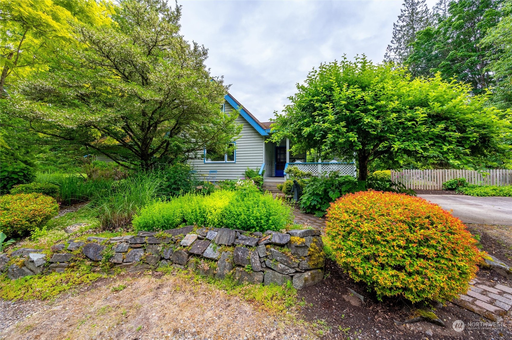1835 High Noon Road Bellingham, WA 98226 - Photo 30 of 40 a view of a garden with plants and large trees